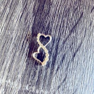 Diamond and 10k double heart pendant